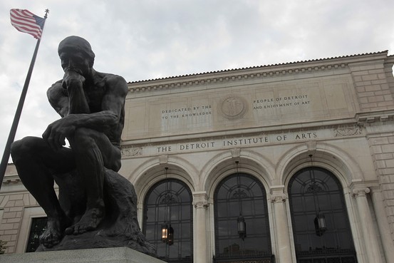 A statue of sculptor Aguste Rodin’s ‘The Thinker’ is seen in front of the Detroit Institute of Arts museum along Woodward Avenue in Detroit, July 21, 2013.